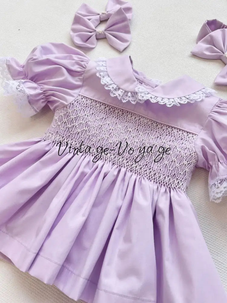 PRE-ORDER & GET IT NEXT WEEK! DAISY LILAC HAND-SMOCKED SHORTER DRESS,KNICKERS & HAIR ACCESSORIES Baby & Toddler Dresses