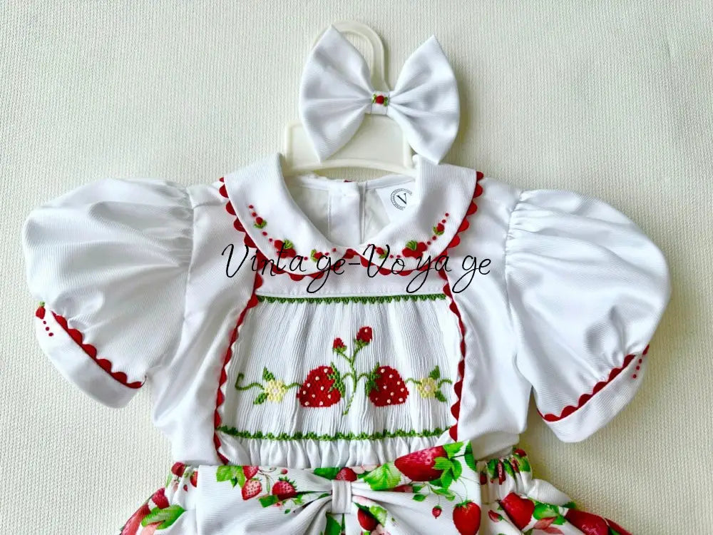 PRE-ORDER & GET IT NEXT WEEK! JUISY STRAWBERRY PRINT HAND-SMOCKED🧵🪡SKIRT SET AND HAIR BOWS OR HEADBAND 🎀🎀 Baby &
