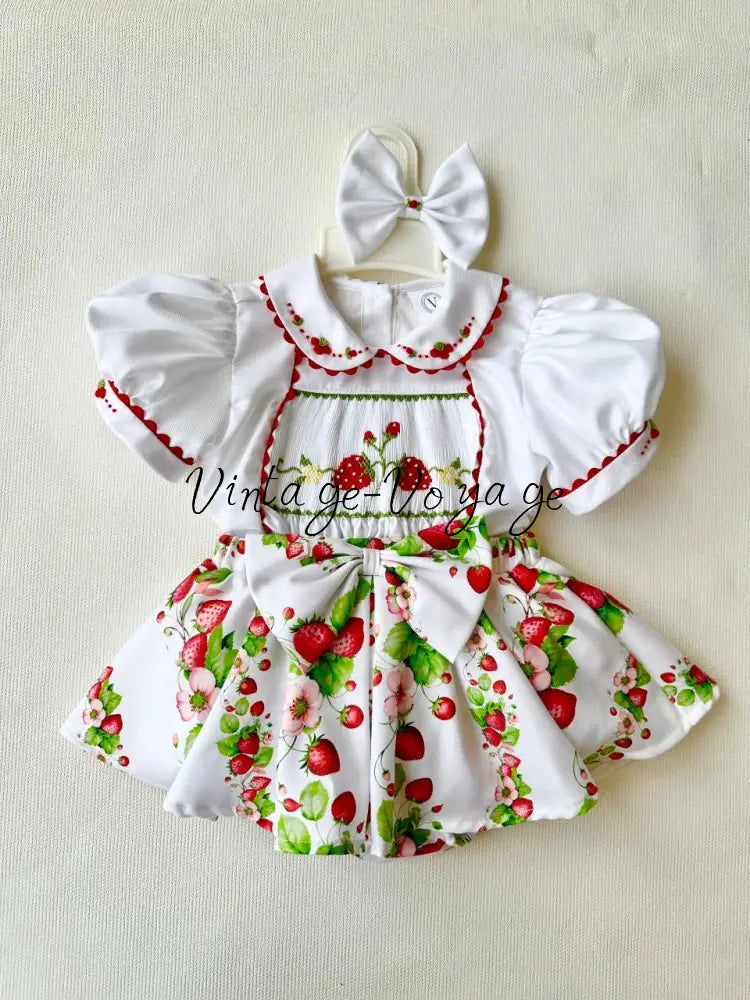 PRE-ORDER & GET IT NEXT WEEK! JUISY STRAWBERRY PRINT HAND-SMOCKED🧵🪡SKIRT SET AND HAIR BOWS OR HEADBAND 🎀🎀 Baby &