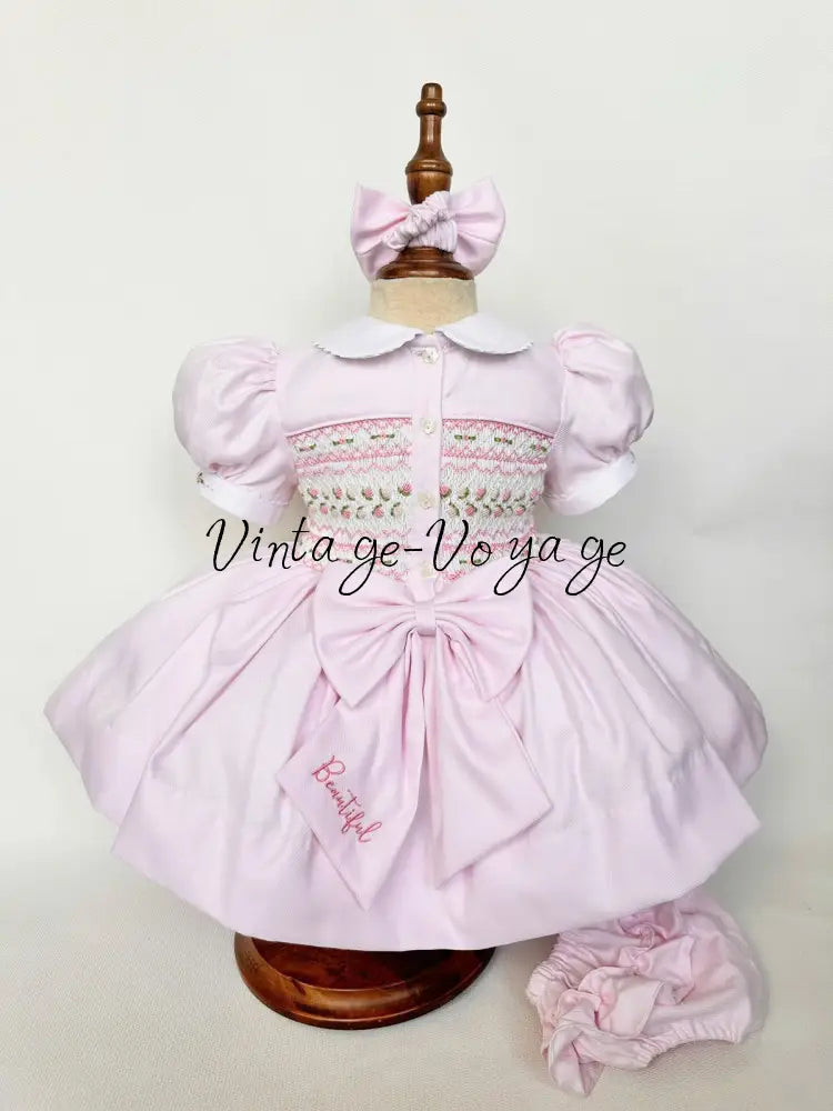 PRE-ORDER & GET IT NEXT WEEK! NEW! PALOMA BABY PINK FRONT & BACK HAND-SMOCKED🧵🪡DRESS & BOWS🎀 Baby & Toddler Dresses