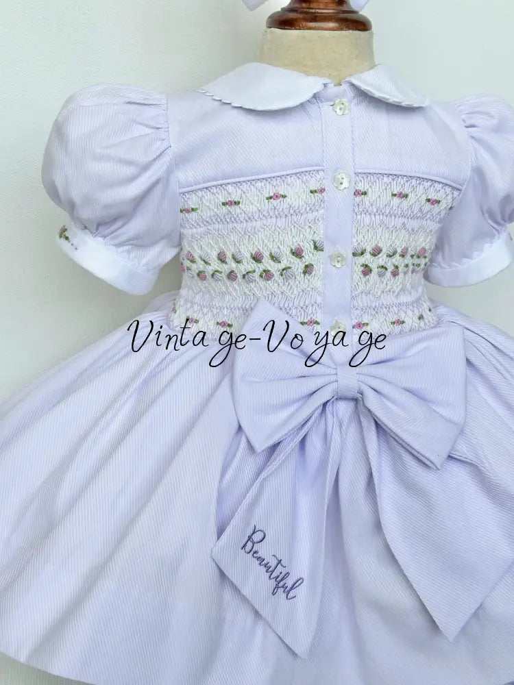 PRE-ORDER & GET IT NEXT WEEK! NEW! PALOMA PASTEL LILAC FRONT & BACK HAND-SMOCKED🧵🪡DRESS & BOWS🎀 Baby & Toddler Dresses
