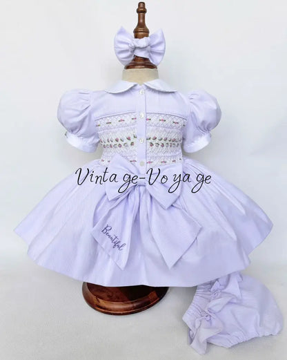 PRE-ORDER & GET IT NEXT WEEK! NEW! PALOMA PASTEL LILAC FRONT & BACK HAND-SMOCKED🧵🪡DRESS & BOWS🎀 Baby & Toddler Dresses