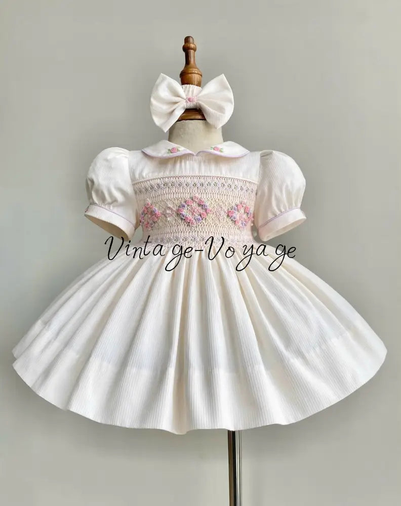 PRE-ORDER & GET IT SOON!NEW! EVANGELINE IVORY HAND-SMOCKED DRESS & ACCESSORIES - Baby & Toddler Dresses