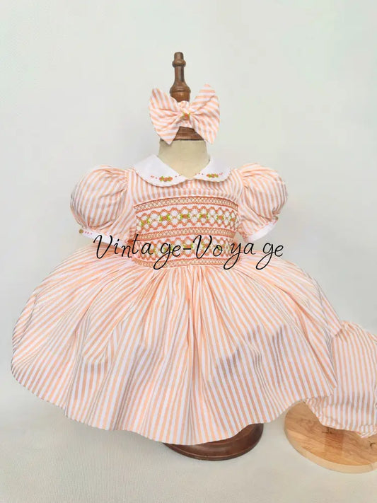 PRE-ORDER & GET NEXT WEEK! NEW! EMMA PEACHY/ORANGE STRIPES HAND-SMOCKED🧵🪡DRESS,PANTIES(3M-24M) & HAIR ACCESSORIES🎀 3M
