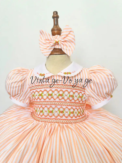 PRE-ORDER & GET NEXT WEEK! NEW! EMMA PEACHY/ORANGE STRIPES HAND-SMOCKED🧵🪡DRESS,PANTIES(3M-24M) & HAIR ACCESSORIES🎀 Baby