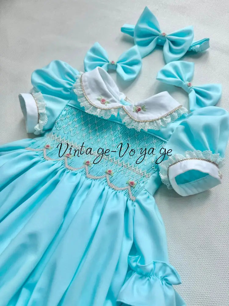 PRE-ORDER & GET NEXT WEEK! OLGA TURQUOISE HAND-SMOCKED ROMPER & HAIR ACCESSORIES🎀 Baby & Toddler Outfits