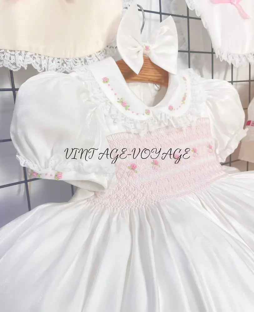PRE-ORDER NOW & GET NEXT WEEK! NEW! MELODY WHITE & PINK HAND-SMOCKED🧵🪡DRESS,BIB,BLOOMERS & HEADBAND OR BOWS🎀🎀 Baby &